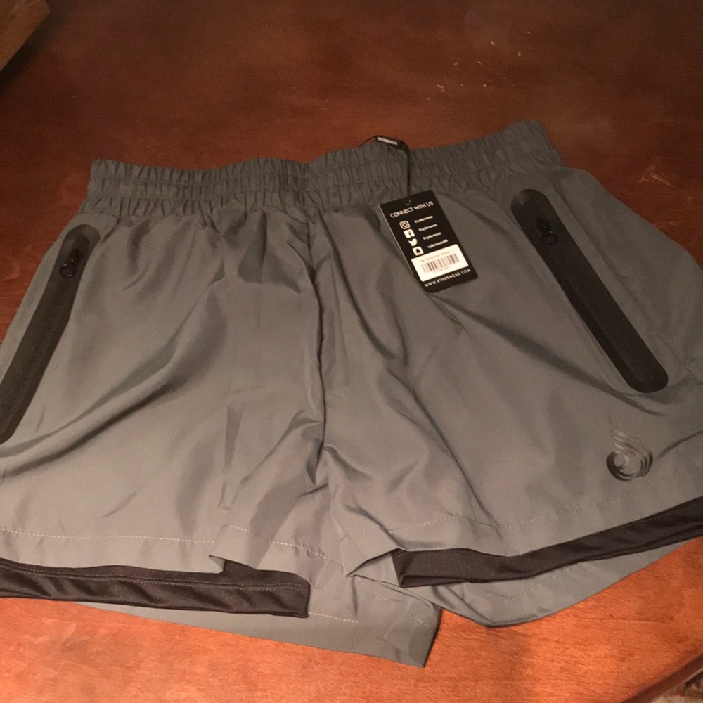 Ryderwear polyester shorts with trading shorts as lining